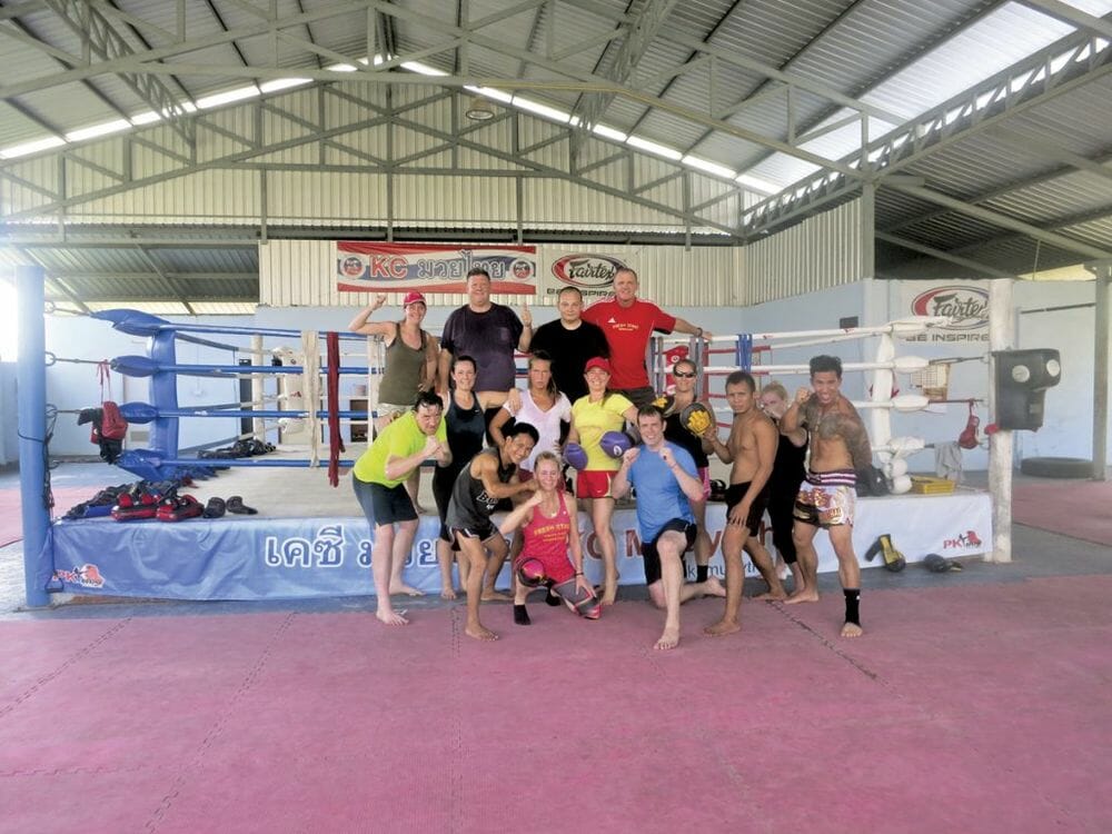 Group shot after the last Muay Thai training session led by lead trainer Chon, former 54kg Northern Thailand national champion